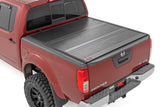 47520501B  -  Hard Low Profile Bed Cover - 5' Bed - Cargo Mgmt - Nissan Frontier (05-21)