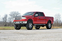 Load image into Gallery viewer, ford-lift-kit_576n2-install-red_3.jpg